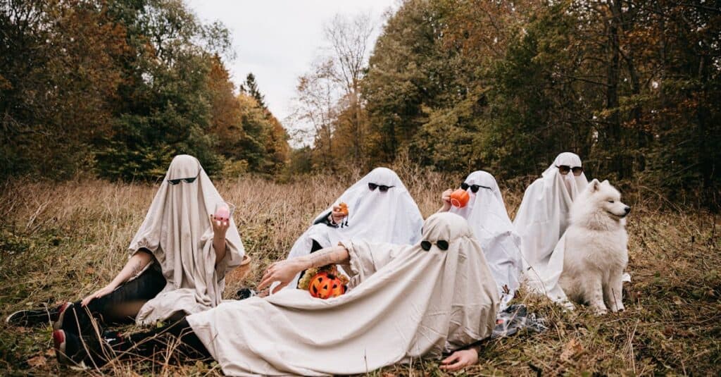 ghost costumes enjoying halloween
